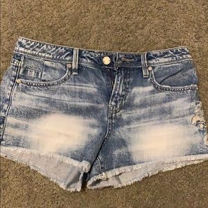 Buckle black jean shorts